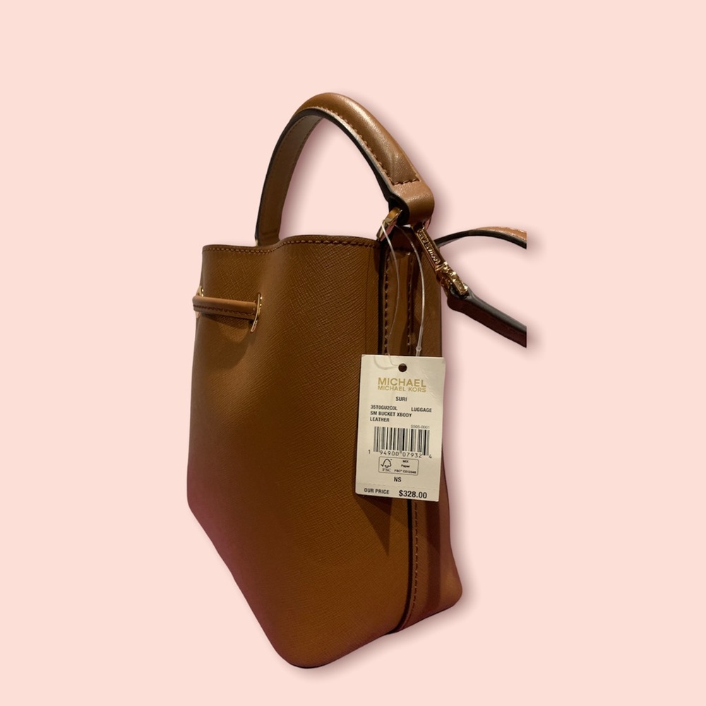 Brand New Michael Kors cross body cinch bag